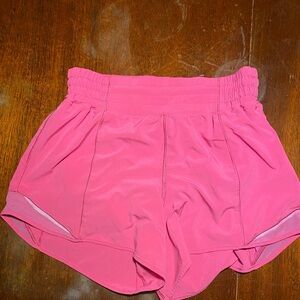 Bright pink Size 6 Lululemon High Rise Hotty Hot Shorts. 4.5 inch inseam